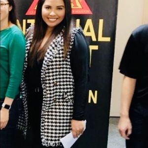 Black and white vest.